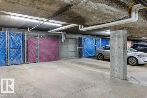 206 6083 Maynard Way, Edmonton, AB - Indoor Photo Showing Garage
