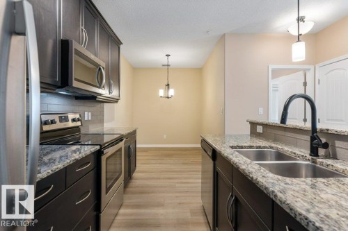 206 6083 Maynard Way, Edmonton, AB - Indoor Photo Showing Kitchen With Double Sink With Upgraded Kitchen