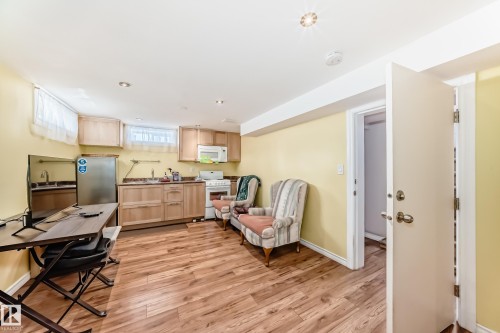 Sitting room with light wood finished floors - 3634 113 Avenue, Edmonton, AB - Indoor