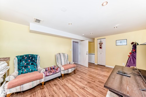 Office area featuring light wood-style flooring and baseboards - 3634 113 Avenue, Edmonton, AB - Indoor