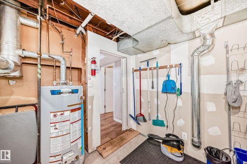 Utilities with water heater - 3634 113 Avenue, Edmonton, AB - Indoor Photo Showing Basement