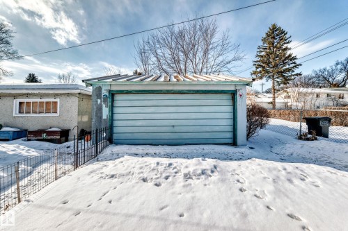 Snow covered garage with a detached garage - 3634 113 Avenue, Edmonton, AB - Outdoor