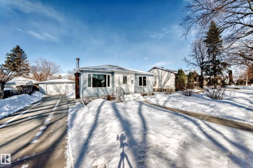 View of front of house featuring an outbuilding and a garage - 3634 113 Avenue, Edmonton, AB - Outdoor