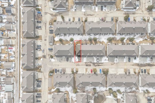 Aerial view of the property, highlighted in red, situated within a community of residences - 123 230 Edwards Drive, Edmonton, AB - Other