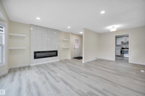 2010 46 Street, Edmonton, AB - Indoor Photo Showing Living Room With Fireplace