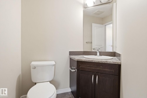 main floor 1/2 bath - 2011 72 Street Sw, Edmonton, AB - Indoor Photo Showing Bathroom