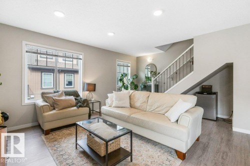 102 3305 Orchards Link Link, Edmonton, AB - Indoor Photo Showing Living Room