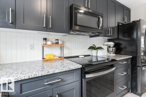 102 3305 Orchards Link Link, Edmonton, AB - Indoor Photo Showing Kitchen With Upgraded Kitchen