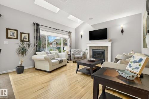 1079 Mckinney Green, Edmonton, AB - Indoor Photo Showing Living Room With Fireplace