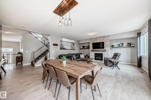 2011 201 Street, Edmonton, AB - Indoor Photo Showing Dining Room With Fireplace