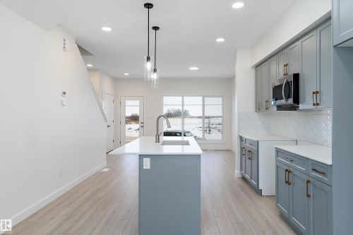 4574 Warbler Loop, Edmonton, AB - Indoor Photo Showing Kitchen With Upgraded Kitchen