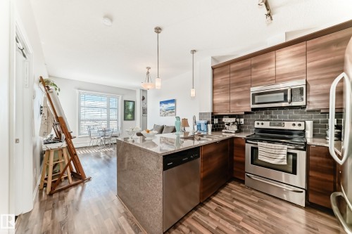 406 2590 Anderson Way, Edmonton, AB - Indoor Photo Showing Kitchen With Stainless Steel Kitchen