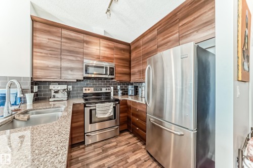 406 2590 Anderson Way, Edmonton, AB - Indoor Photo Showing Kitchen With Stainless Steel Kitchen With Double Sink With Upgraded Kitchen