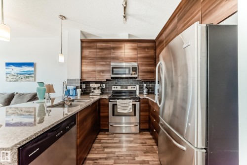 406 2590 Anderson Way, Edmonton, AB - Indoor Photo Showing Kitchen With Stainless Steel Kitchen With Double Sink