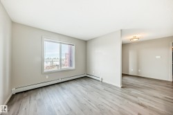 The property features light-colored walls and wood-style flooring throughout - 