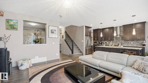 1027 Coopers Hawk Link Link, Edmonton, AB - Indoor Photo Showing Living Room