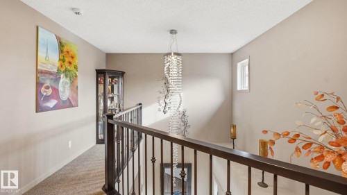 1027 Coopers Hawk Link Link, Edmonton, AB - Indoor Photo Showing Other Room