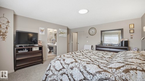 1027 Coopers Hawk Link Link, Edmonton, AB - Indoor Photo Showing Bedroom