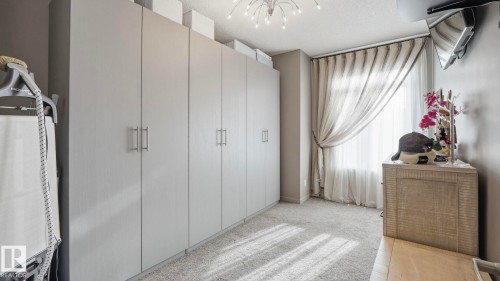 1027 Coopers Hawk Link Link, Edmonton, AB - Indoor Photo Showing Other Room