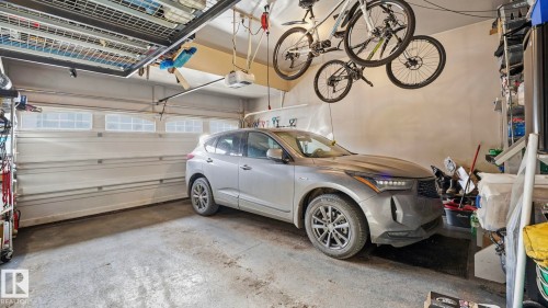 1027 Coopers Hawk Link Link, Edmonton, AB - Indoor Photo Showing Garage
