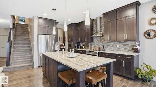 1027 Coopers Hawk Link Link, Edmonton, AB - Indoor Photo Showing Kitchen With Upgraded Kitchen