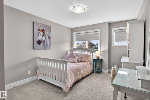 9036 24 Avenue, Edmonton, AB - Indoor Photo Showing Bedroom
