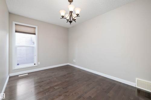 Large flex space could be used as formal dining room, workout room or huge office - 1310 114B Street, Edmonton, AB - Indoor Photo Showing Other Room