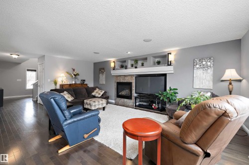1310 114B Street, Edmonton, AB - Indoor Photo Showing Living Room With Fireplace