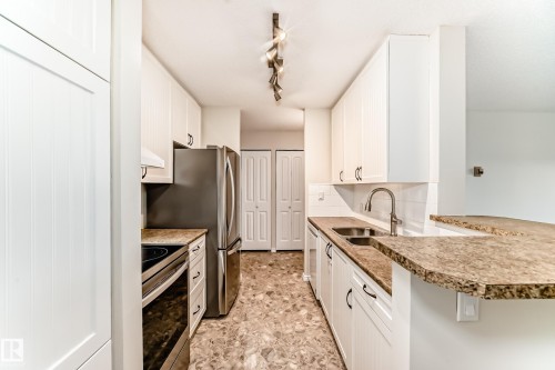1404 11307 99 Avenue, Edmonton, AB - Indoor Photo Showing Kitchen With Double Sink