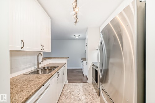 1404 11307 99 Avenue, Edmonton, AB - Indoor Photo Showing Kitchen With Double Sink