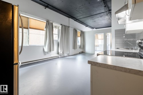 305 10024 Jasper Avenue, Edmonton, AB - Indoor Photo Showing Kitchen With Double Sink