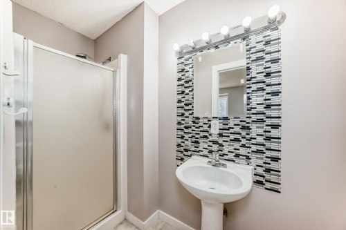 Full bath featuring a stall shower - 11609 125 Street, Edmonton, AB - Indoor Photo Showing Bathroom