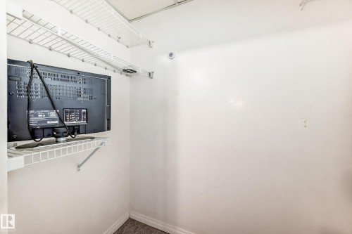 View of walk in closet - 11609 125 Street, Edmonton, AB - Indoor