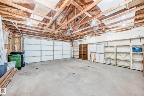 Garage with a garage door opener - 11609 125 Street, Edmonton, AB - Indoor Photo Showing Garage