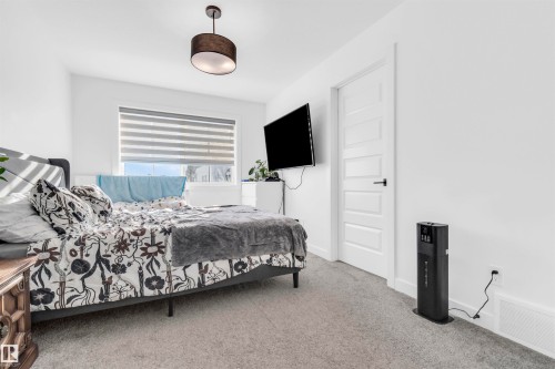 Unit 9 1910 Collip View, Edmonton, AB - Indoor Photo Showing Bedroom