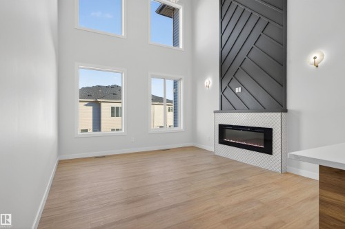17 Hull Wynd, Spruce Grove, AB - Indoor Photo Showing Living Room With Fireplace