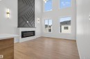 19 Hull Wynd, Spruce Grove, AB  - Indoor Photo Showing Other Room With Fireplace 