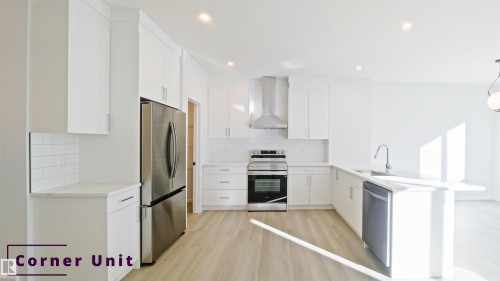 7694 174A Avenue, Edmonton, AB - Indoor Photo Showing Kitchen With Upgraded Kitchen