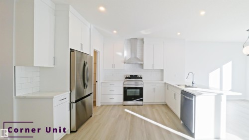 7694 174A Avenue, Edmonton, AB - Indoor Photo Showing Kitchen With Upgraded Kitchen