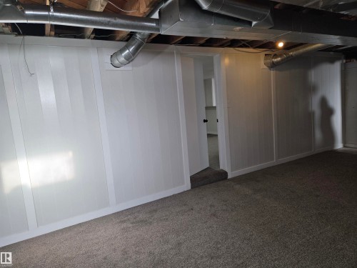 Basement featuring carpet - 13023 Sherbrooke Avenue, Edmonton, AB - Indoor Photo Showing Basement