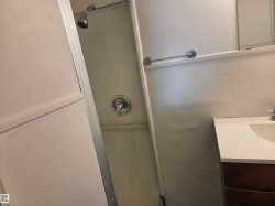 Full bathroom with vanity and a shower - 