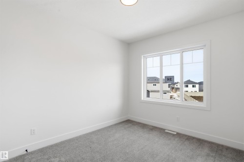 24 Meadowgrove Landing, Spruce Grove, AB - Indoor Photo Showing Other Room
