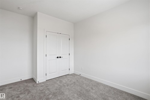 24 Meadowgrove Landing, Spruce Grove, AB - Indoor Photo Showing Other Room