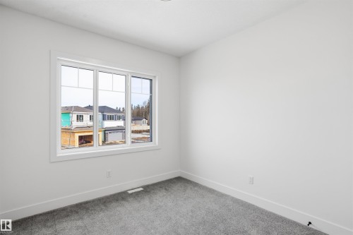 24 Meadowgrove Landing, Spruce Grove, AB - Indoor Photo Showing Other Room