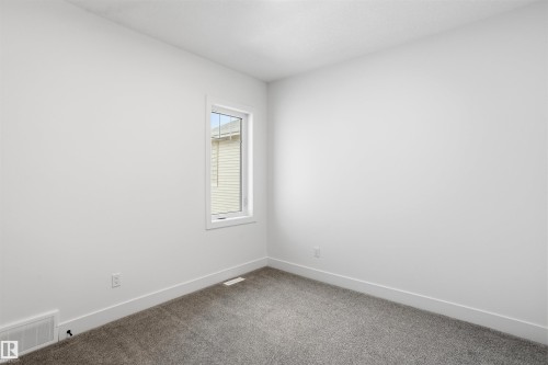 24 Meadowgrove Landing, Spruce Grove, AB - Indoor Photo Showing Other Room