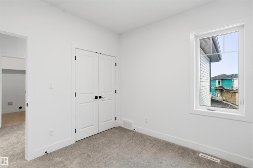 24 Meadowgrove Landing, Spruce Grove, AB - Indoor Photo Showing Other Room