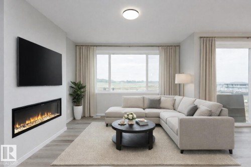 3945 Wren Loop, Edmonton, AB - Indoor Photo Showing Living Room With Fireplace