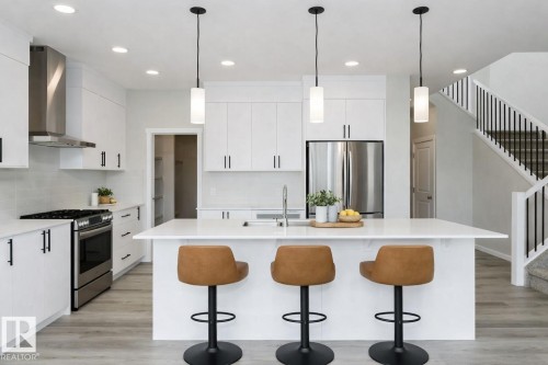 3945 Wren Loop, Edmonton, AB - Indoor Photo Showing Kitchen With Stainless Steel Kitchen With Double Sink With Upgraded Kitchen