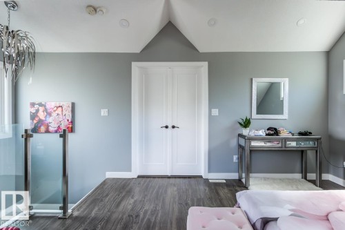 The property features dark wood flooring, light grey walls, and white trim - 9526 109A Avenue, Edmonton, AB - Indoor