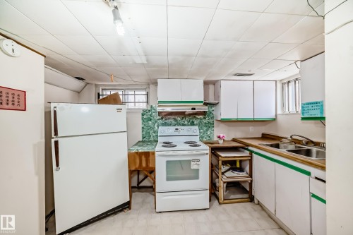 11239 97 Street, Edmonton, AB - Indoor Photo Showing Kitchen With Double Sink
